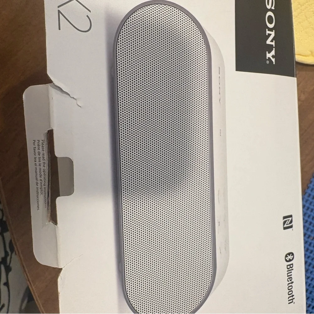 Sony Portable Bluetooth Speaker in white and silver